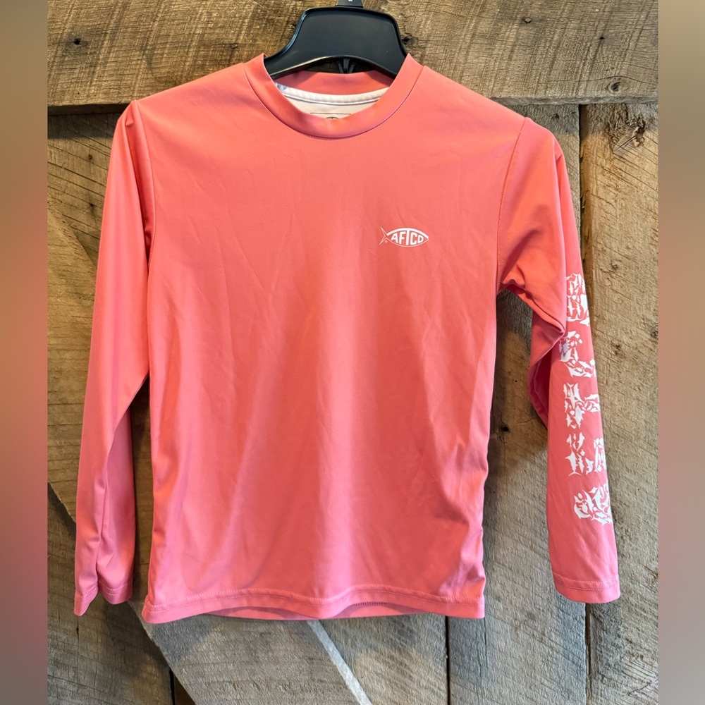AFTCO Kids Pink Long Sleeve Samurai performance shirt.